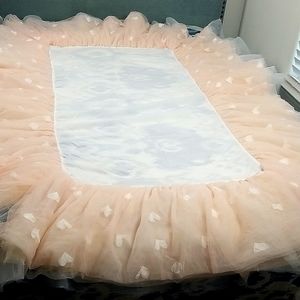 Pottery Barn Kids Crib Skirt. Pale pink and white tull.